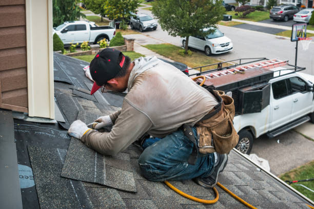 Professional Roofing technician working in Wantagh, NY